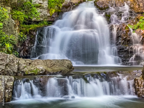 Stock photo of small waterfall in the mountains © oldmn