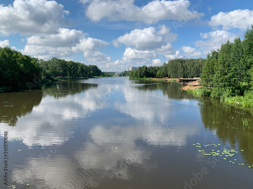 Moscow region  the city of Balashikha. Clouds over Pekhorka river in summer day