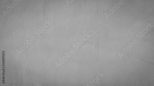 Texture of gray concrete wall surface. Some crack and scratch, suitable for use as a pattern or background image.