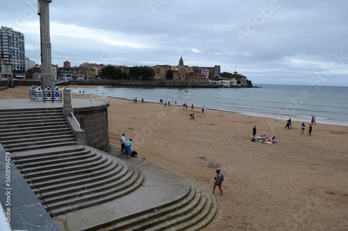 The biggest entrance of San Lorenzo Beach with the stairs and people.