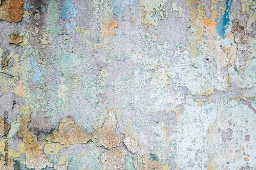 wall with colorful dirty cracked texture