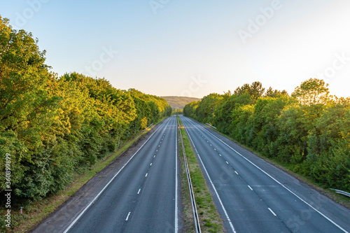 Empty dual carriageway during sunset