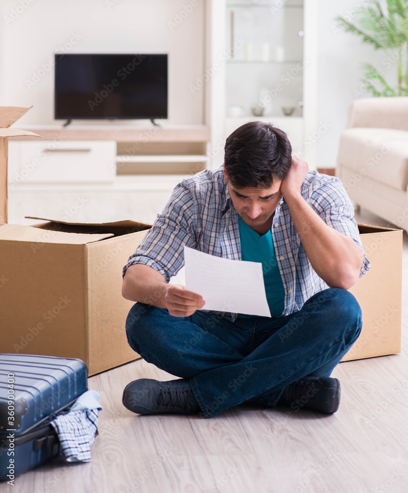 Unemployed man receiving foreclosure notice letter Unemployed man receiving foreclosure notice letter