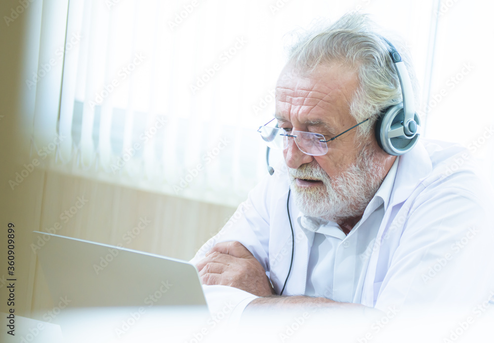 Doctor making online video conference to give advice to patient Doctor making online video conference to give advice to patient