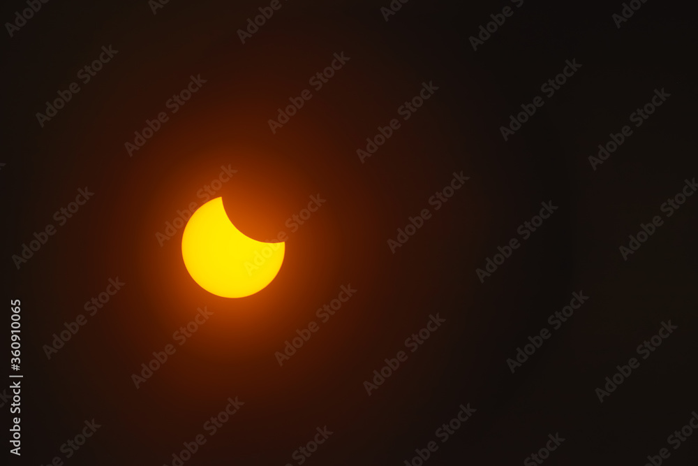 Solar eclipse in dark red glowing sky, amazing scientific background Solar eclipse in dark red glowing sky, amazing scientific background