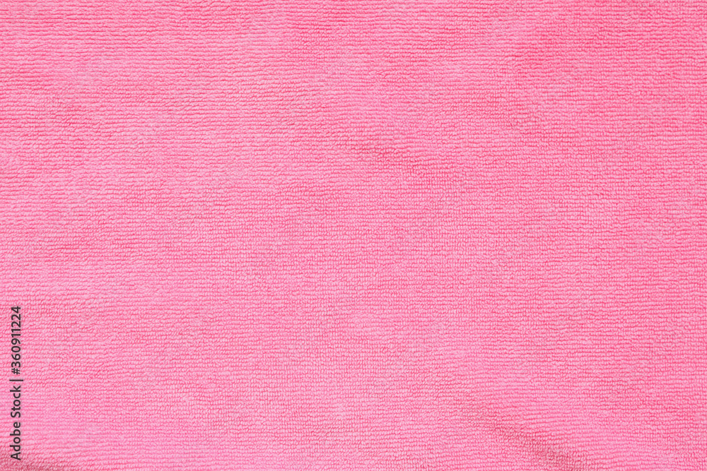 Fototapeta premium Pink towel fabric texture surface close up background