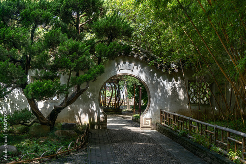 Ancient traditional garden, Suzhou garden, in China. Translation: like a curve