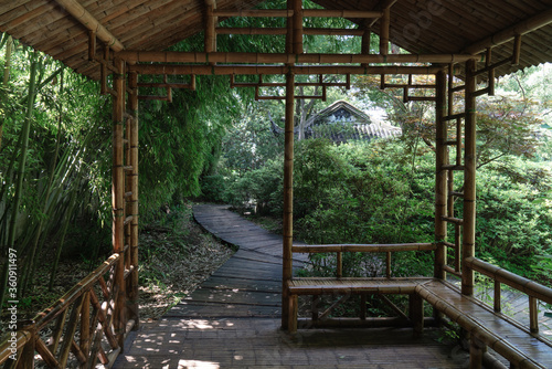 Ancient bamboo cabin and the path  Suzhou garden  in China.