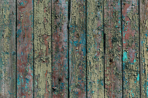 Old grunge background of wooden cracked fence. Space for text. Wooden walpaper