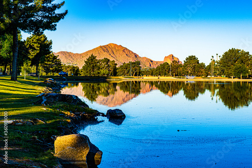 Camelback mountain reflected in the lake photo