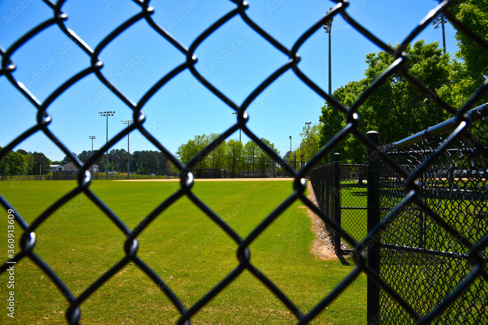 Empty Baseball Field Closed during Coronavirus Pandemic Empty Baseball Field Closed during Coronavirus Pandemic