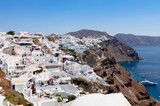 View of the white-walled houses characteristic of Santorini Island nestled along the cliff, Oia, Santorini, Cyclades Islands, Greece