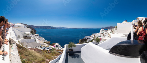 Panoramic view of the Aegean Sea and Santorini Island from the viewpoint located in Oia, Cyclades Islands, Greece