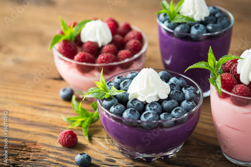 Berry fruit dessert in the glass bowl