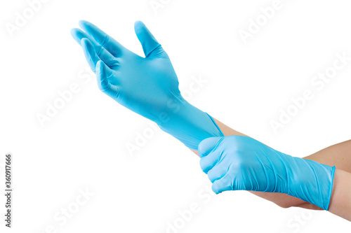 Fototapeta Naklejka Na Ścianę i Meble -  Doctor wearing a medical glove on hands isolated on white