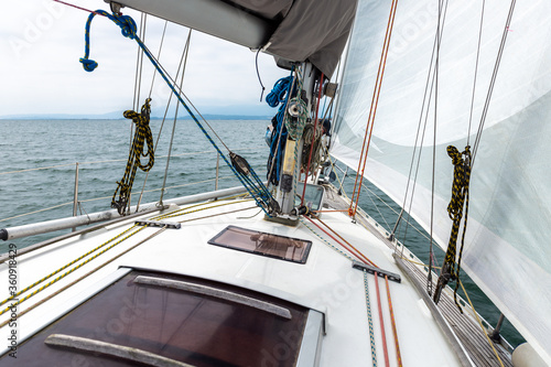 sea view from the deck of a white sailing yacht