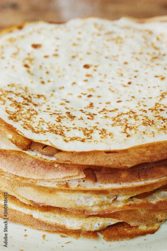 Delicious fresh crepe on the plate macro Delicious fresh crepe on the plate macro