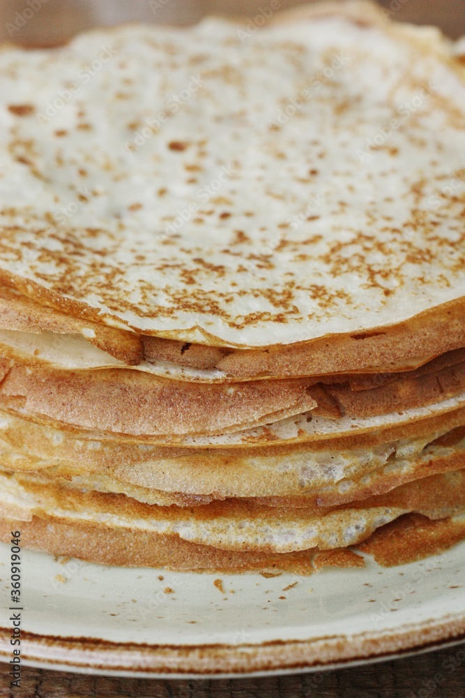 Delicious fresh crepe on the plate macro Delicious fresh crepe on the plate macro