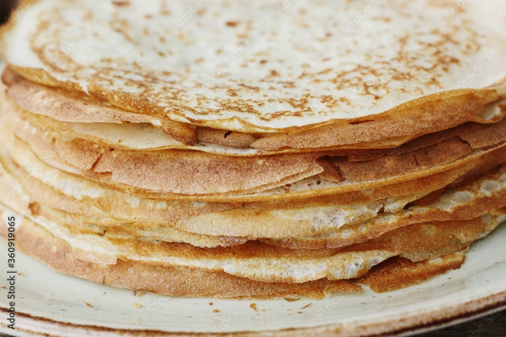 Delicious fresh crepe on the plate macro Delicious fresh crepe on the plate macro