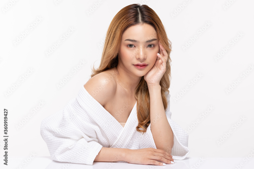 Beautiful Asian woman look at camera smile with clean and fresh skin Beautiful Asian woman look at camera smile with clean and fresh skin