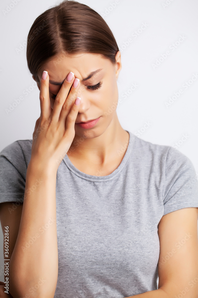 Head pain, exhausted young woman has suffering from unbearable headache Head pain, exhausted young woman has suffering from unbearable headache