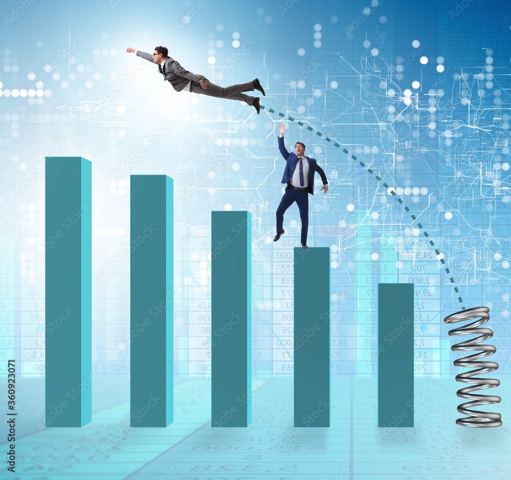 Businessman outperforming his competition jumping over Businessman outperforming his competition jumping over