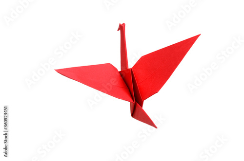 A red paper bird on white