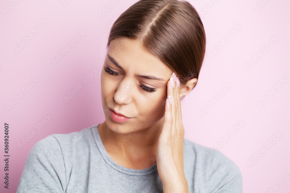 Head pain, exhausted young woman has suffering from unbearable headache Head pain, exhausted young woman has suffering from unbearable headache