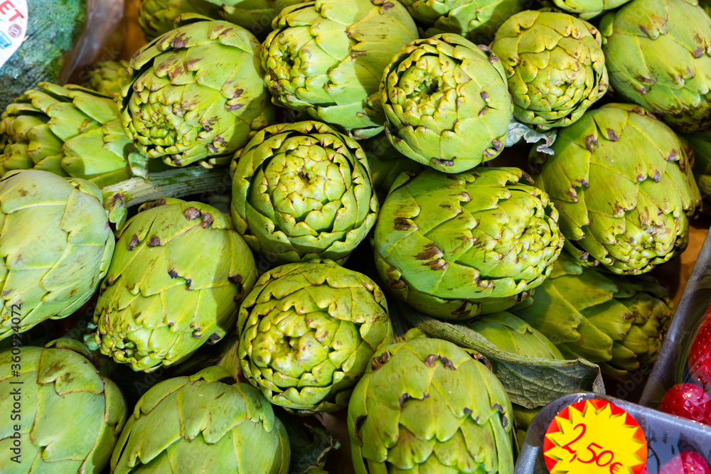 Fototapeta premium Artichokes on showcase of greengrocery