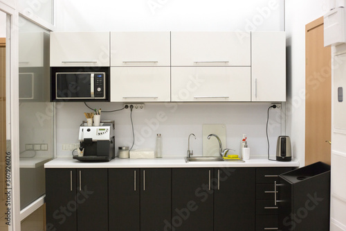Office kitchen interior. Shared kitchen in the office © Oksana