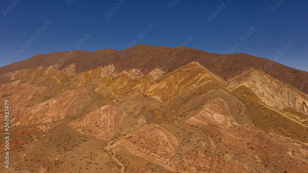 Fototapeta premium Aerial view of drones from Northern Argentina, mountains, valleys, routes and peaks.