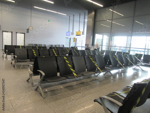 Empty chairs in airport due to covid-19