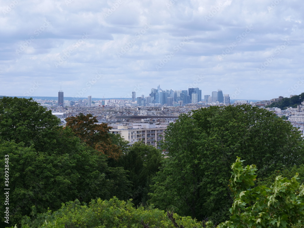 A view of Paris and Montmartre in a cloudy day.