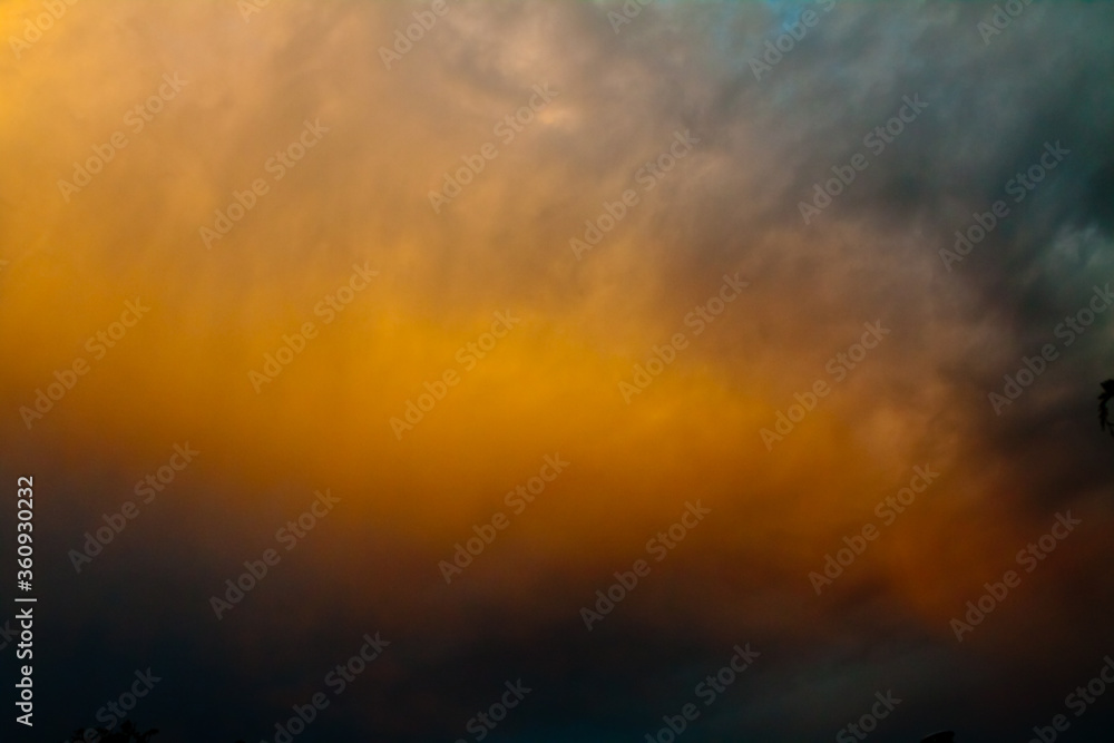 Dramatic cloudscape or sunrise sunset burning orange