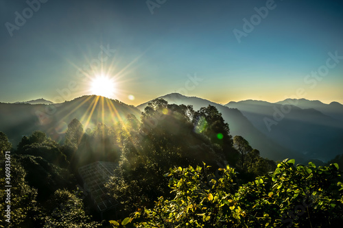 In Uttarakhand  India  the morning sun rises in the Himalayan mountains