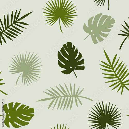 Seamless khaki green jungle leaves pattern on dark green background