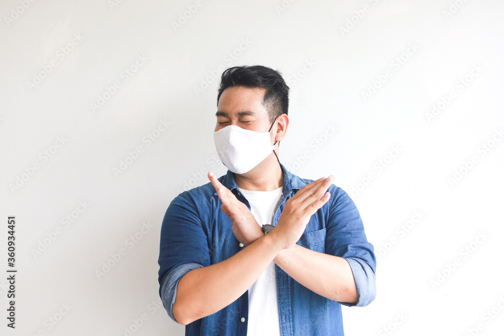 Asian man with face mask on white 