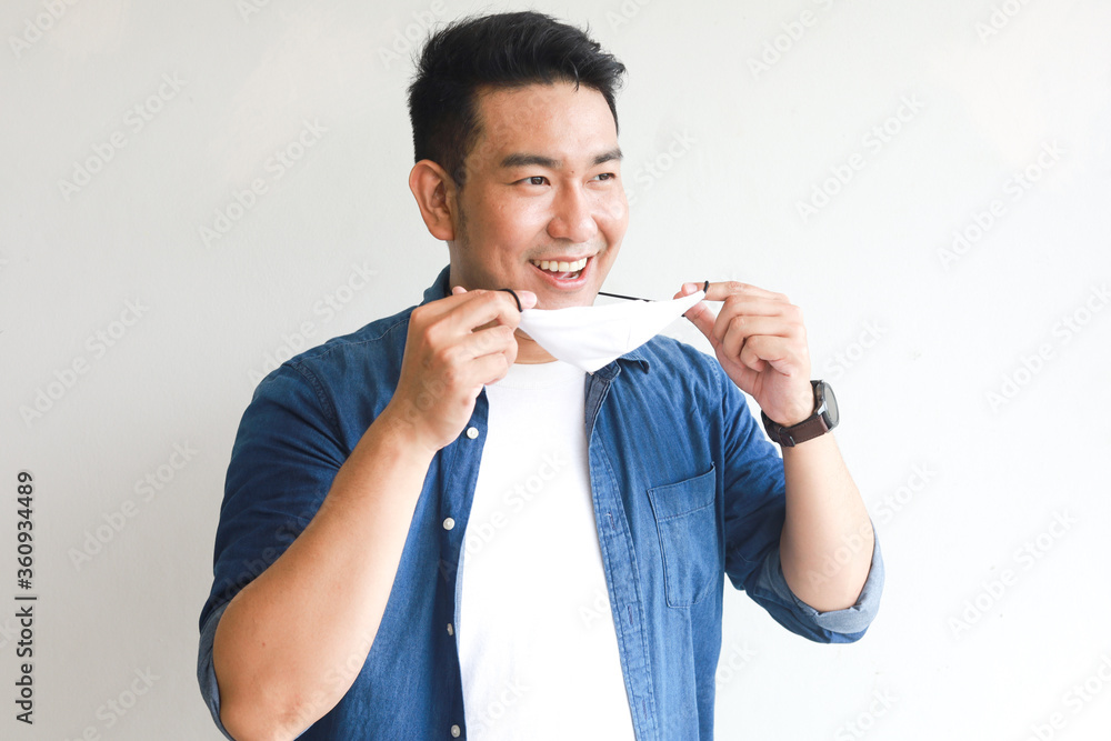 Asian man with face mask on white Asian man with face mask on white