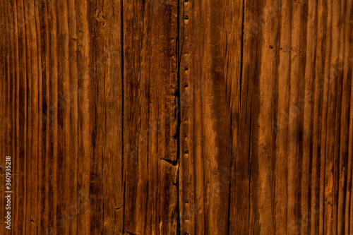 Empty natural brown wooden background. The surface of the old brown wood texture with cracks, top view