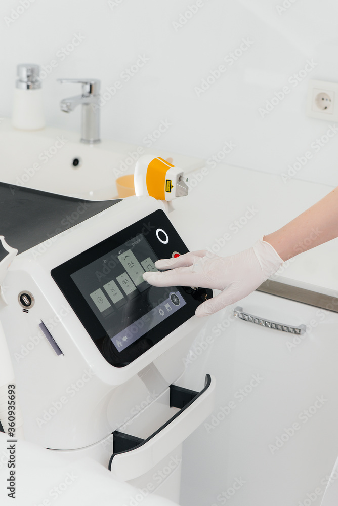 Modern equipment for laser hair removal and hair removal in a beauty salon. Beauty salon and cosmetology Modern equipment for laser hair removal and hair removal in a beauty salon. Beauty salon and cosmetology