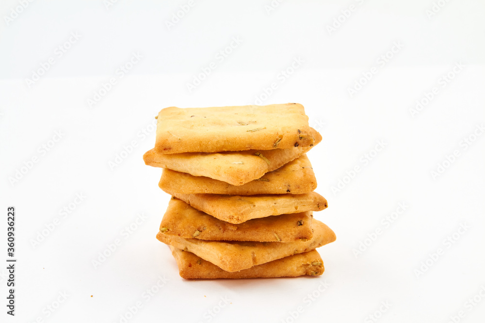 Italian crackers with rosemary and olive oil on a white background Italian crackers with rosemary and olive oil on a white background