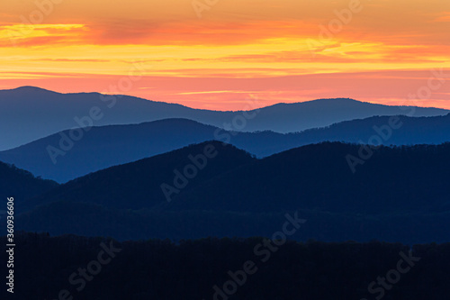 Bright blue color dominates the Blue Ridge mountains at sunset