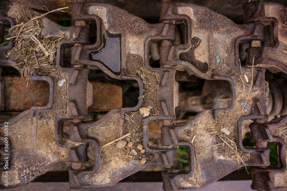 Rusty caterpillar of an old tractor. Rusty caterpillar of an old tractor.
