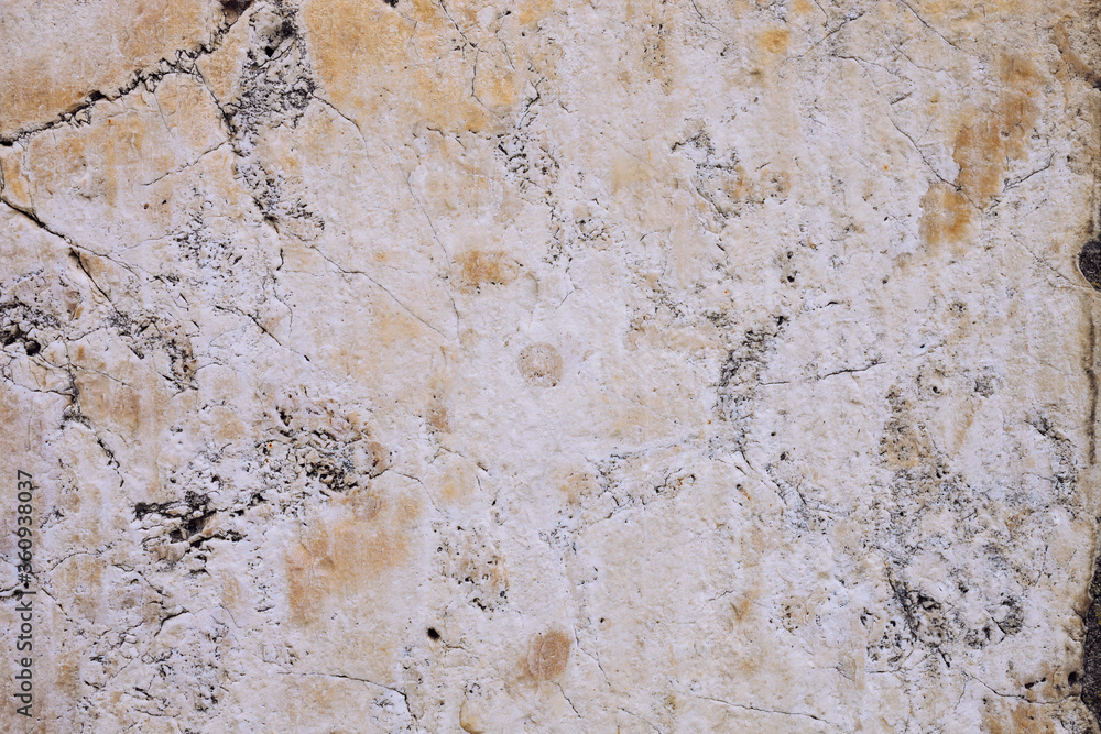 Marble stone wall, cement wall cracked and uneven, weathered wall with space for text, no person and horizontal
Marble stone wall, cement wall cracked and uneven, weathered wall with space for text, no person and horizontal