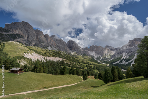 View of Puez-Odle mountain range as seen from Col Raiser, located on a plateau high above Gardena valley, accessed by cable car from St. Christina village, South Tirol, Dolomites, Italy. photo