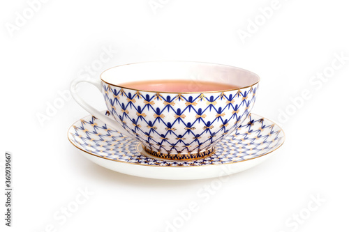 Porcelain cup with tea on white background. Design element with clipping path