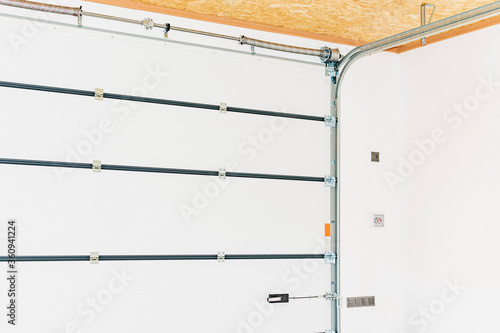 Wallpaper Mural Fragment of the new roller door mounting Torontodigital.ca