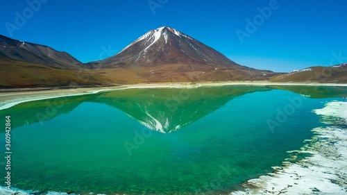 Laguna Verde and Licancabur Volcano  Bolivia. Green colored lake and volcano in the background in the Bolivian desert