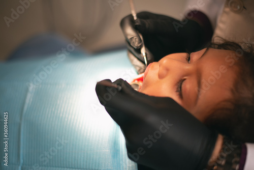 girl with dental care in dental clinic