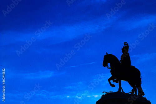 Lisbon, Portugal - may 2019: Silhouette of Equestrian statue of King John I in the Praca da Figueira square